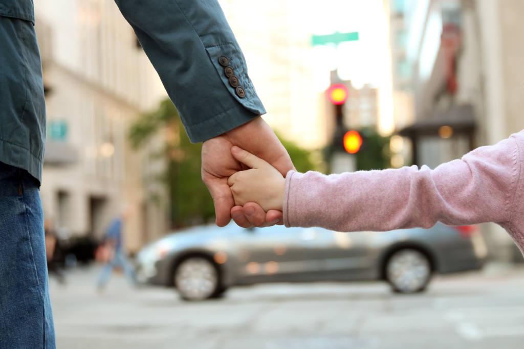 children crossing the pedestrian crossing. teaching children