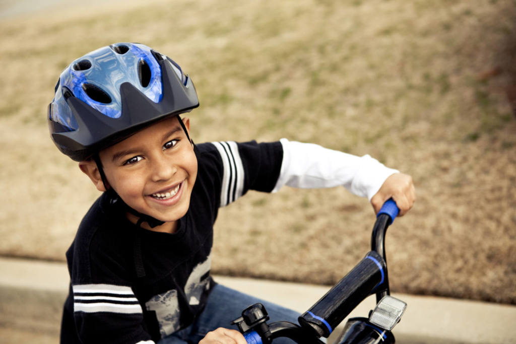 Kids wearing clearance helmet